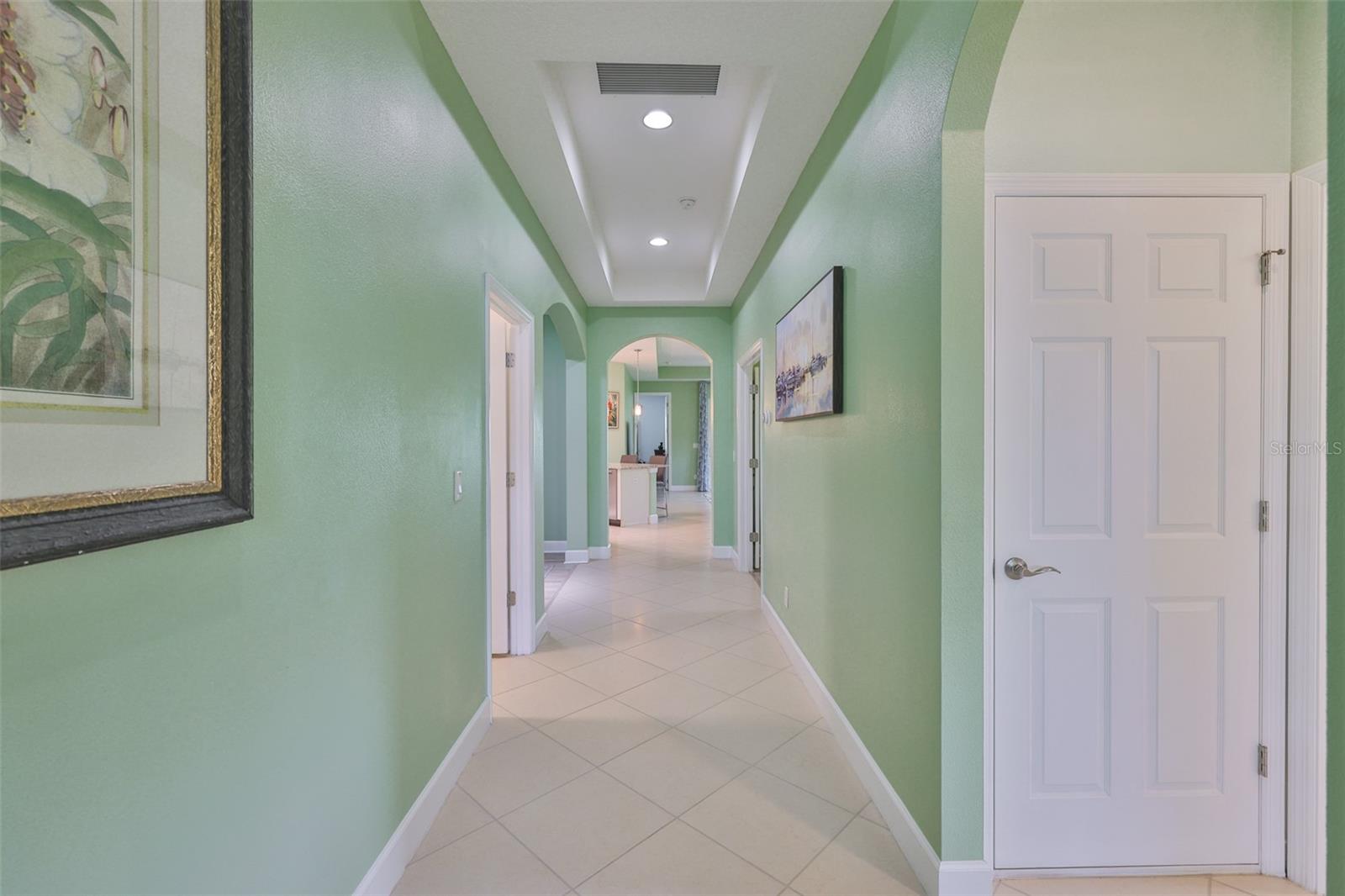 As you enter the villa, notice how bright and wide the hallway is.  The high ceilings and trey features offer a modern and upscale elegance to the home.