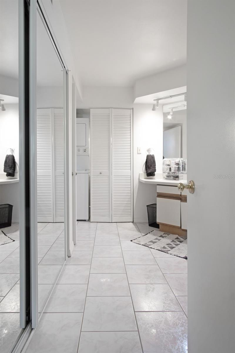 Primary Ensuite, changing area, closets, laundry, vanity/sink