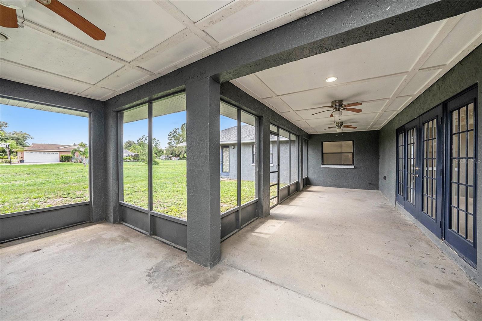 Large screened Patio opens to courtyard