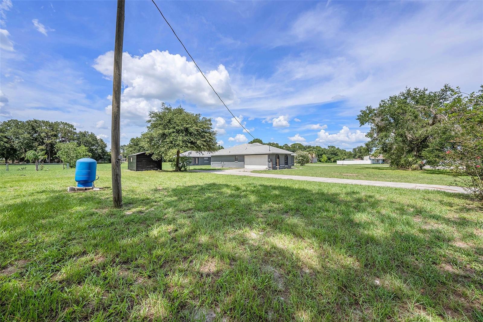 Side yard Well and Shed, Garage View