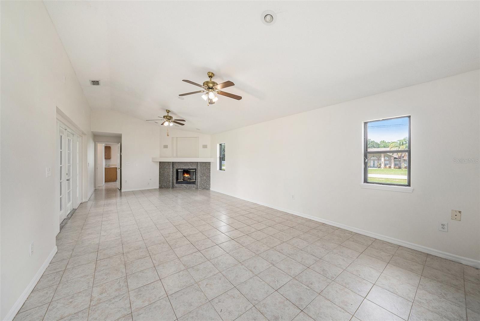 Massive Family Room with wood burning Fireplace