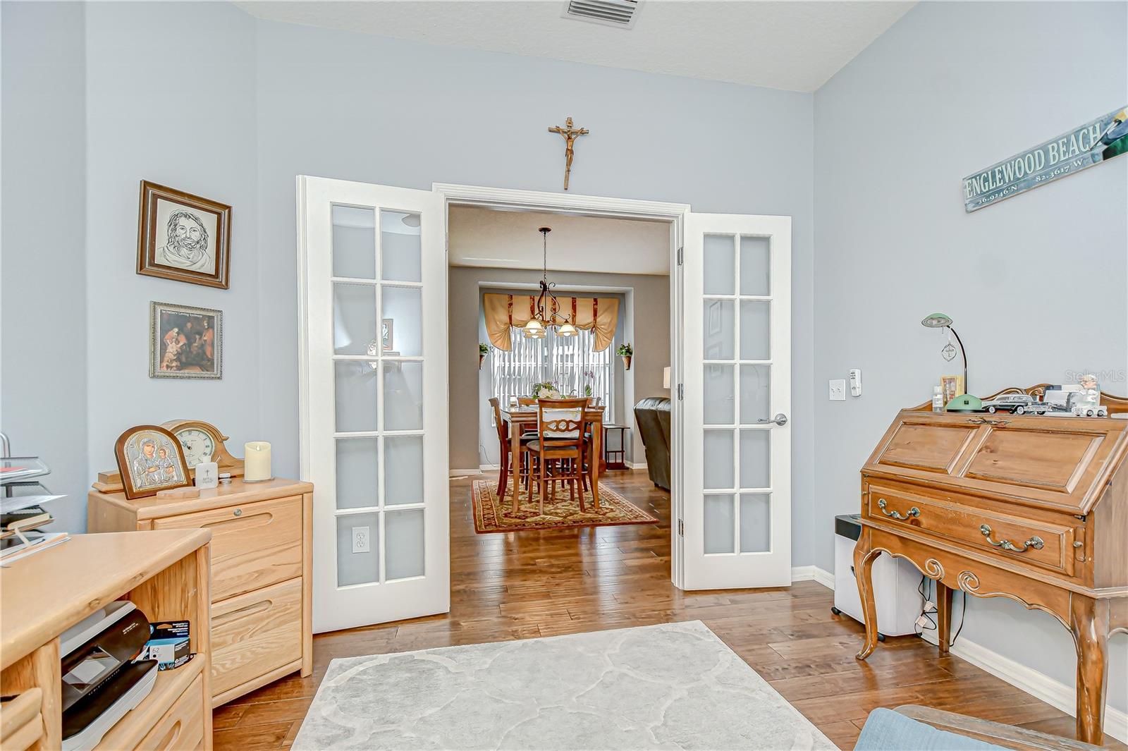 Spacious den with French Doors!