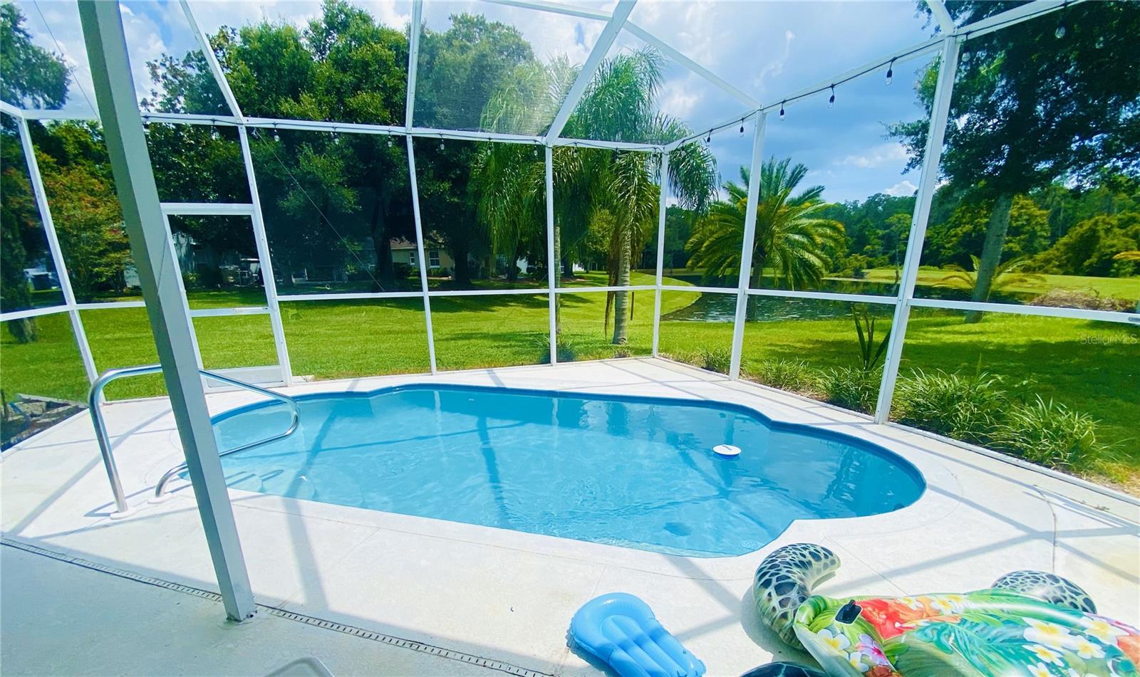 Screened Pool & Lanai Overlooking Pond & Conservation Area