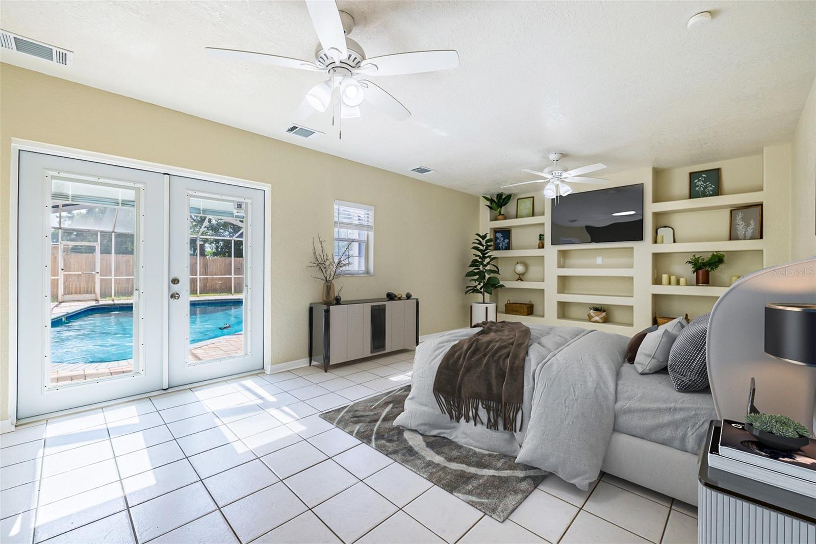 primary suite privately located away from the rest of the home, featuring direct walk-out access to the pool area—your own private retreat