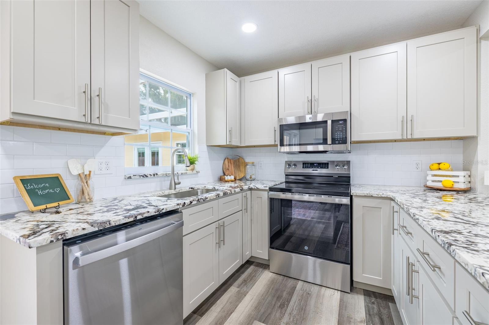 The kitchen is brand new, featuring all-new appliances, an open floorplan, plenty of natural light, and abundant cabinet space.