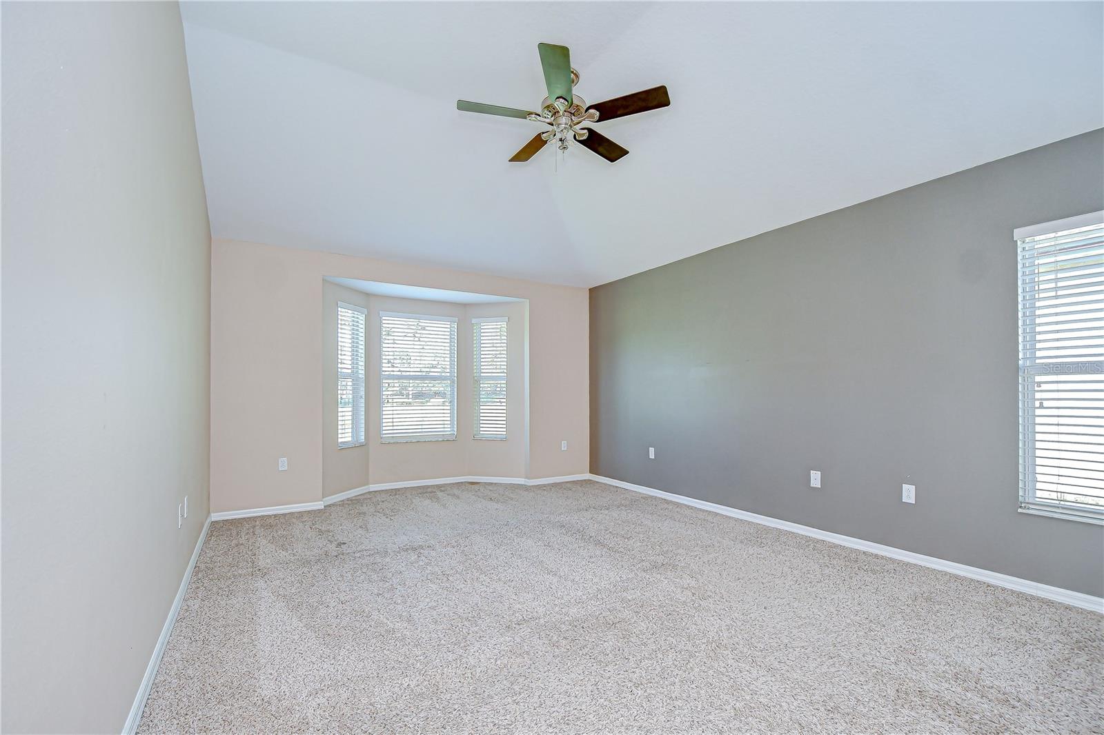 Primary suite is tucked at the back of the home!