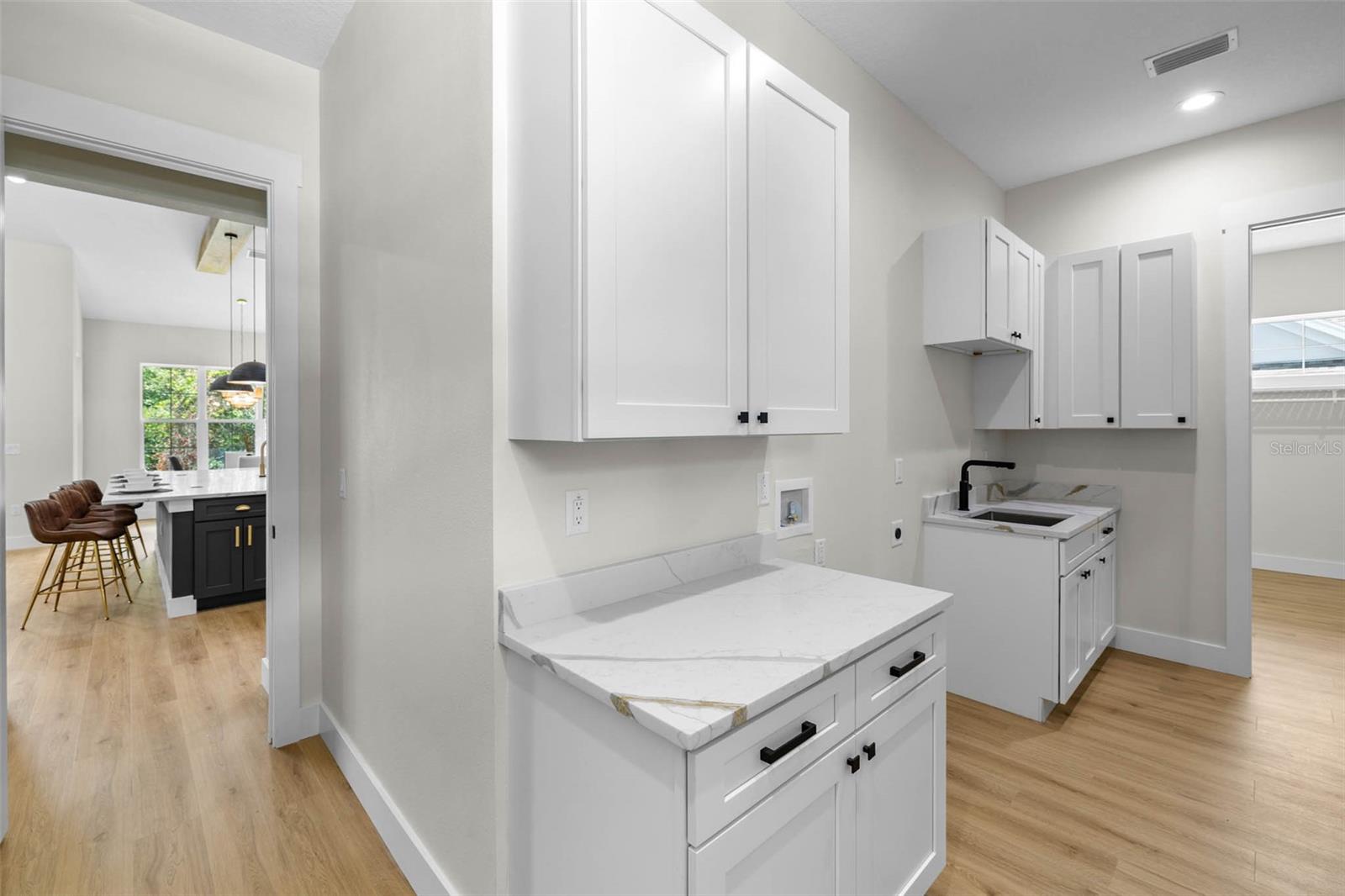 Laundry room with access to the living room