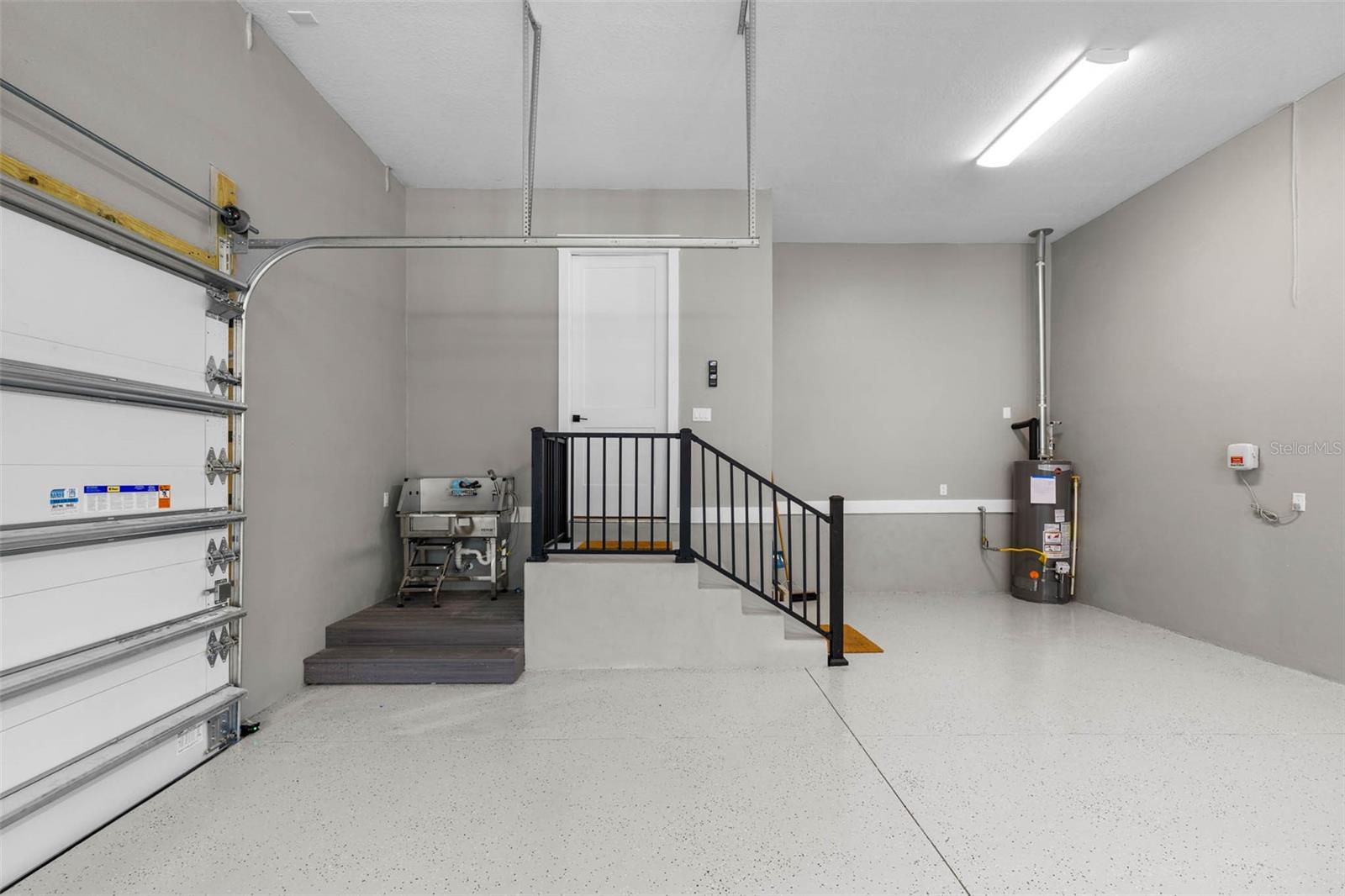 3+Garage with space for a Golf Cart and a Dog Washing Station