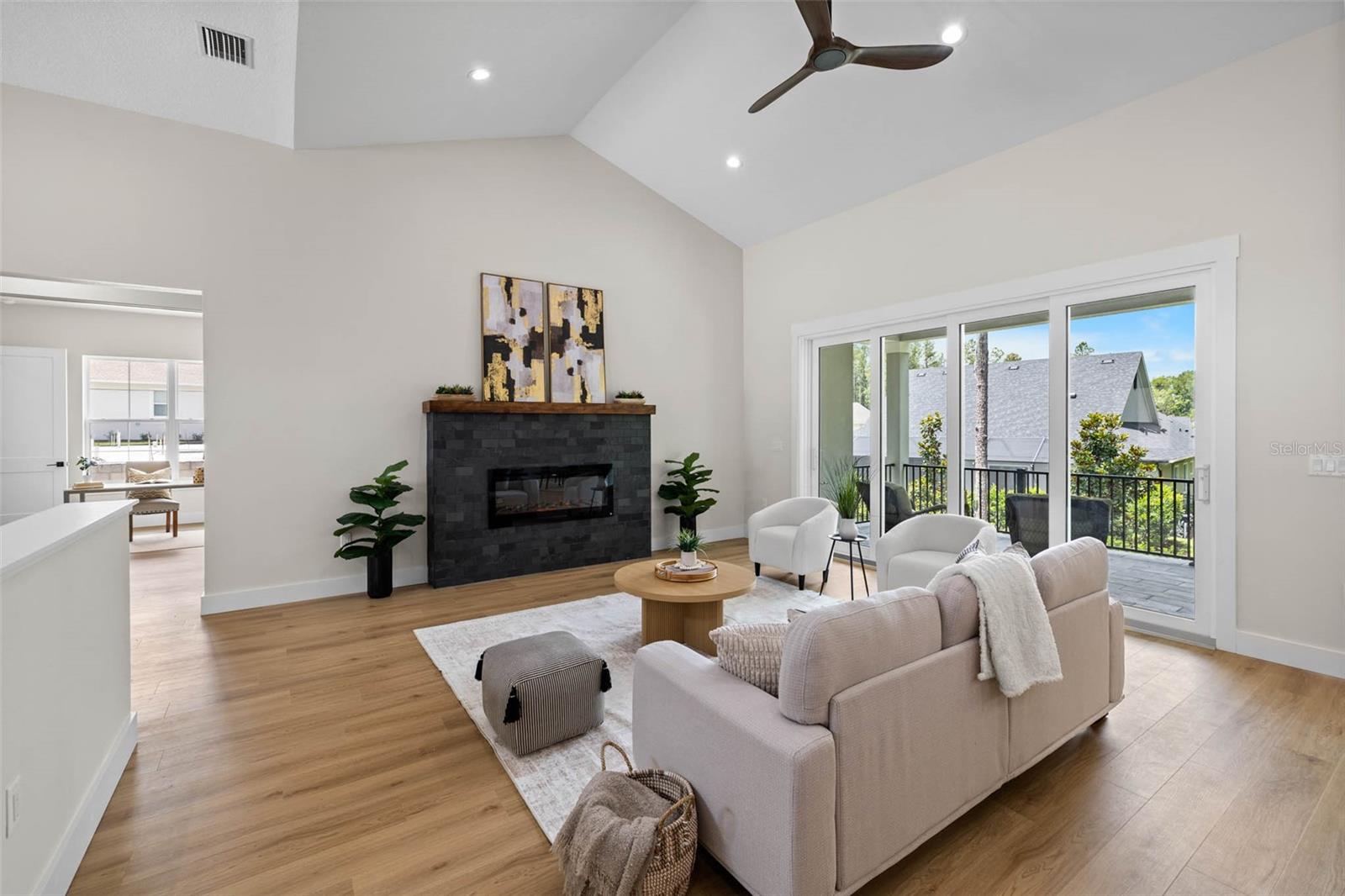 Living room has a built in fireplace