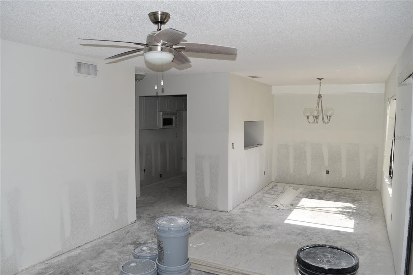 Living room, dining room and doorway to kitchen