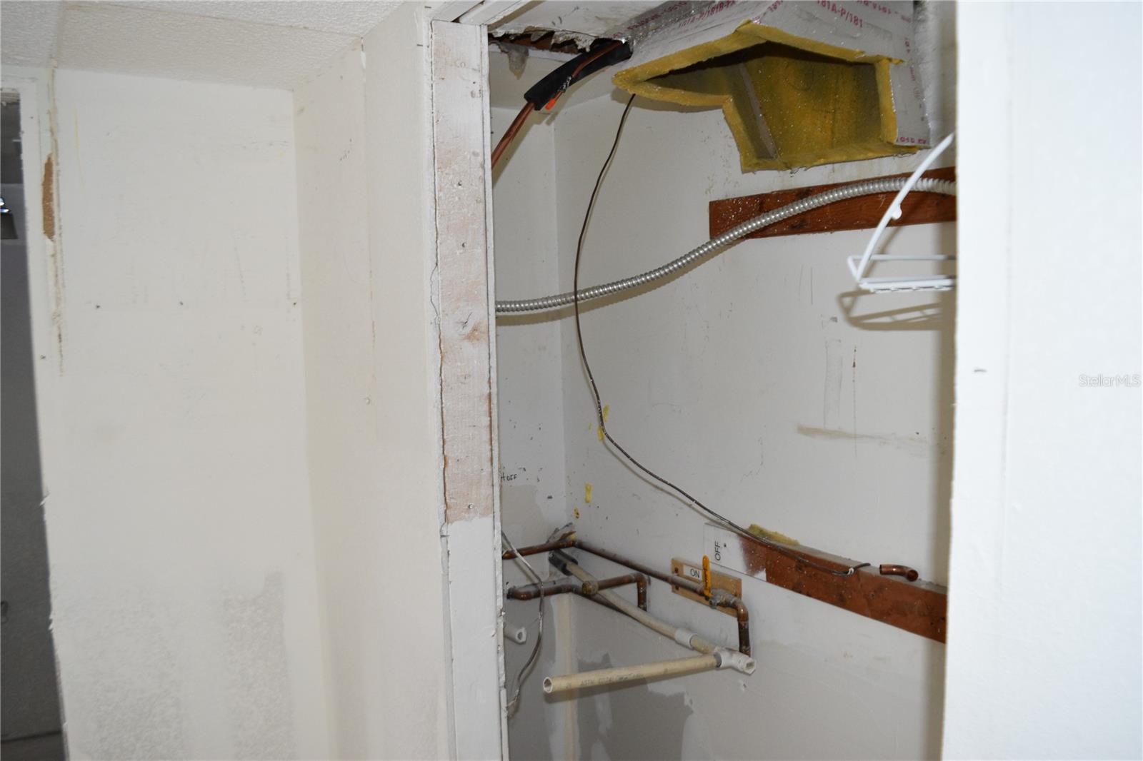 Utility closet for Hot water heater and AC handler