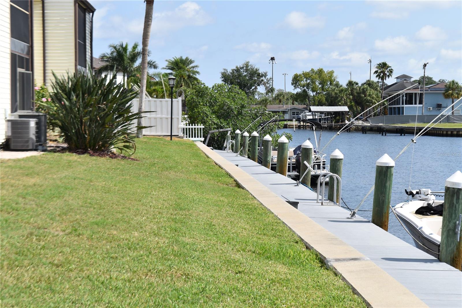 Canal view facing North leading to Whitcomb Bayou which leads to the Anclote river and out to the Gulf of America