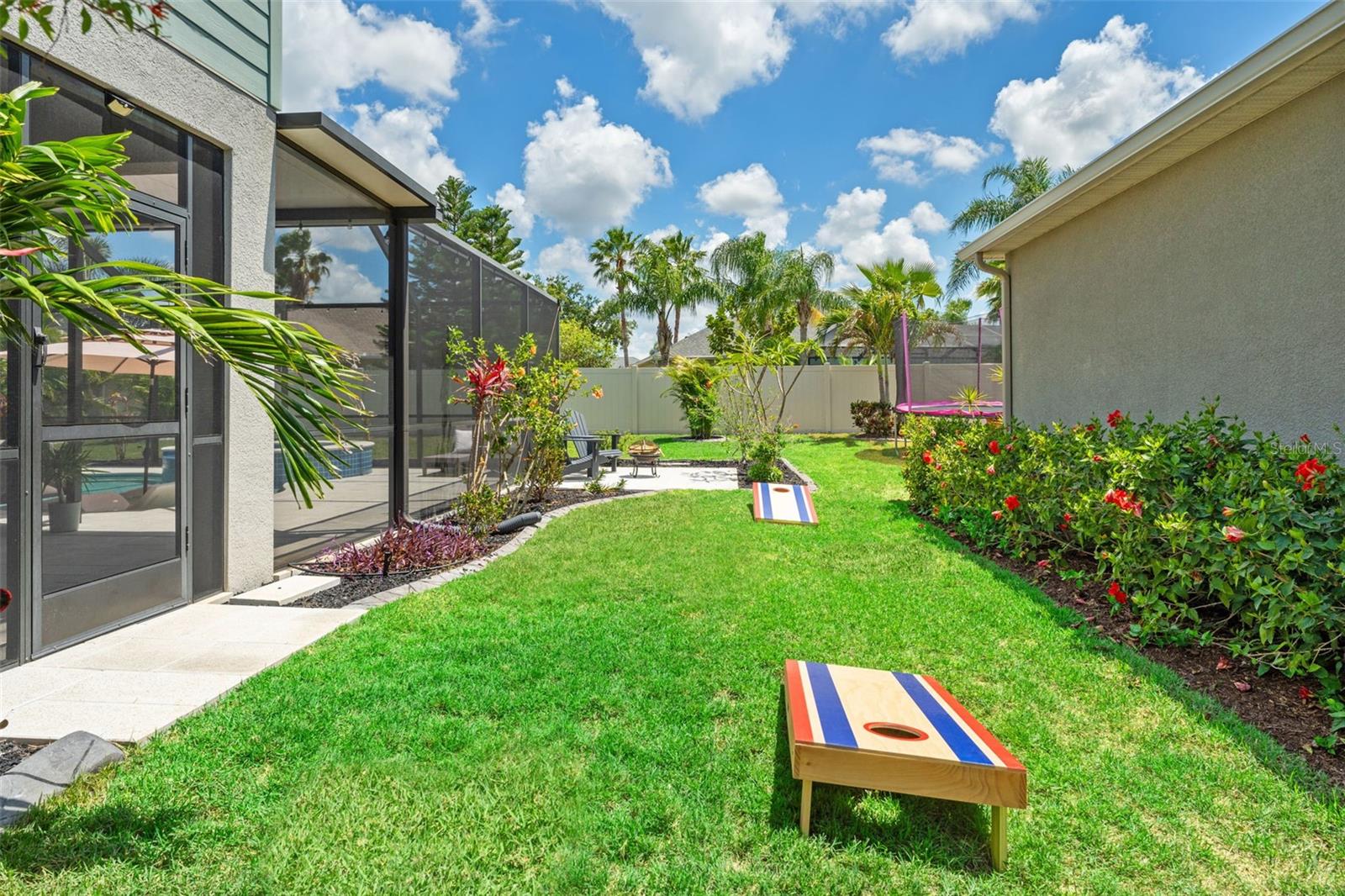 side yard.. perfect for cornhole