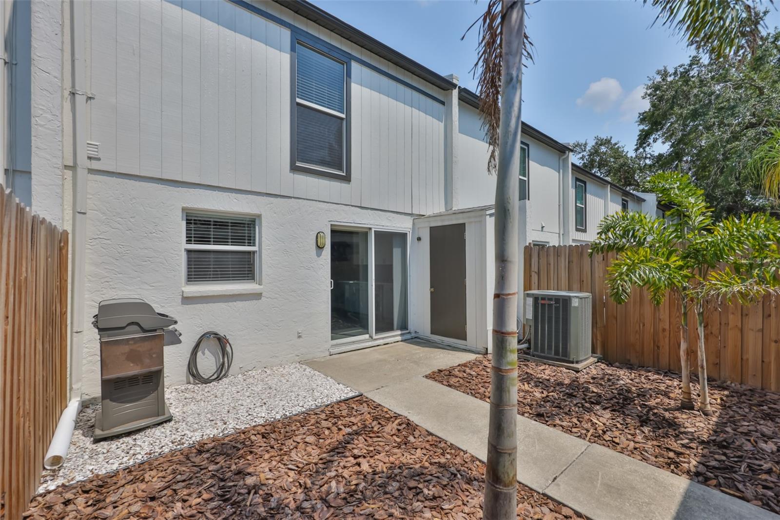 Back of home with Outside Storage