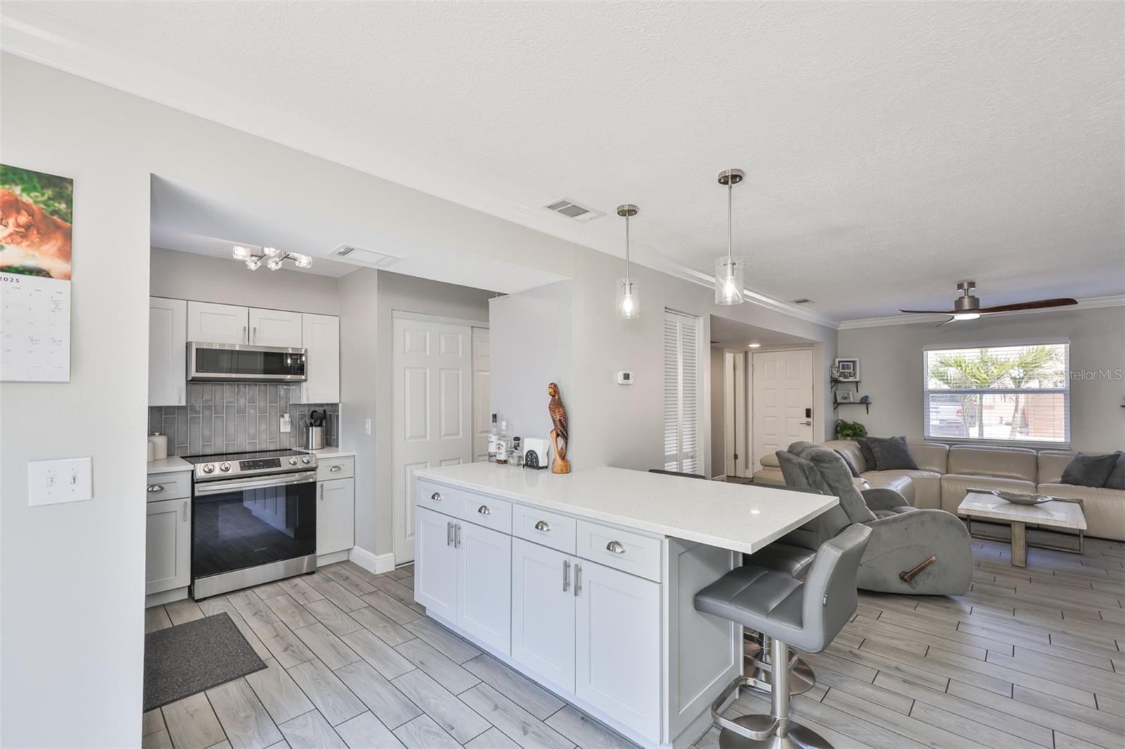 Kitchen overlooking Living Room