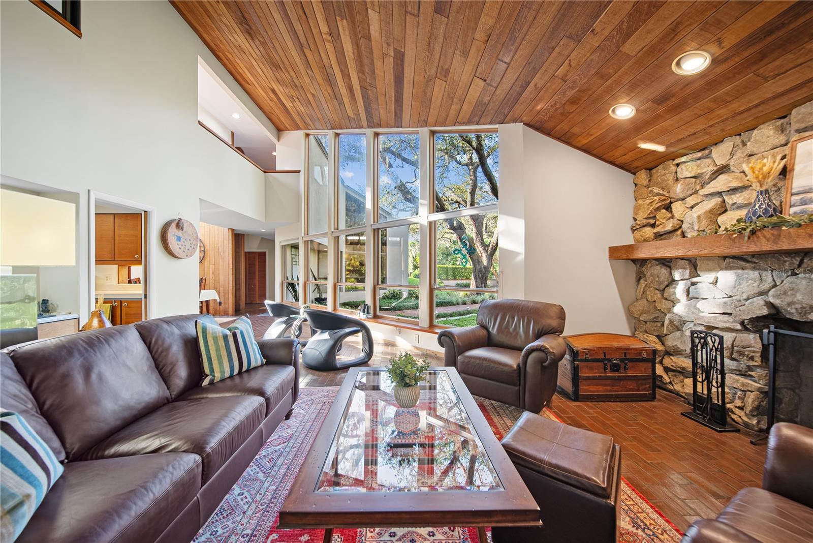 Soaring Vaulted Ceilings and a Beautiful Stone Fireplace!