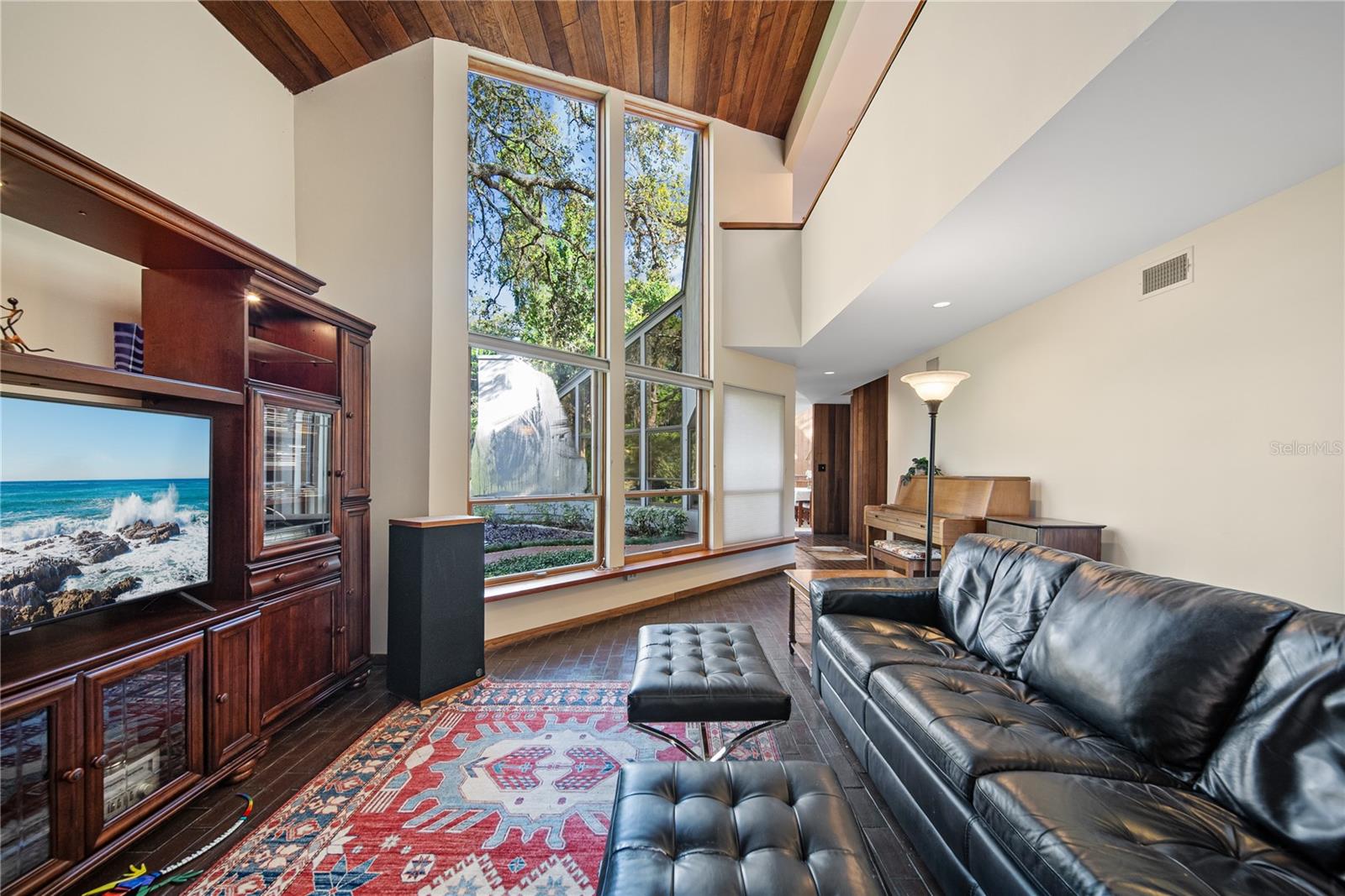 With Soaring Cedar lined ceilings and lots of natural light