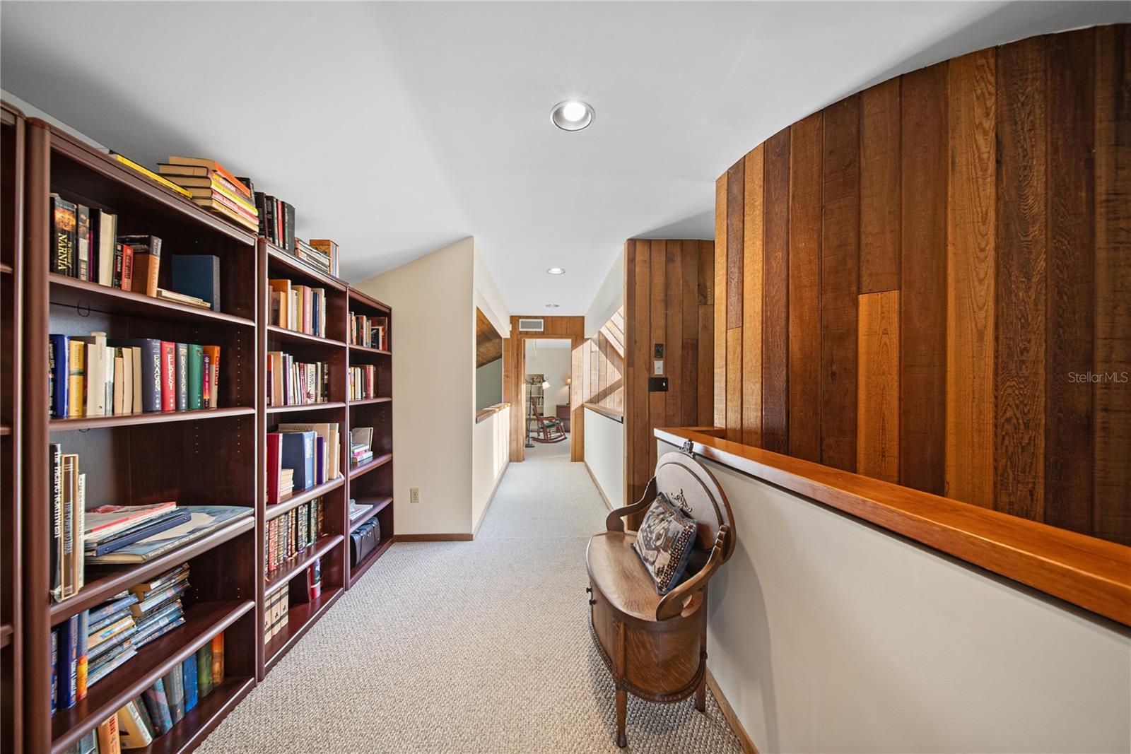 Plenty of loft space to store your books or have a small sitting area