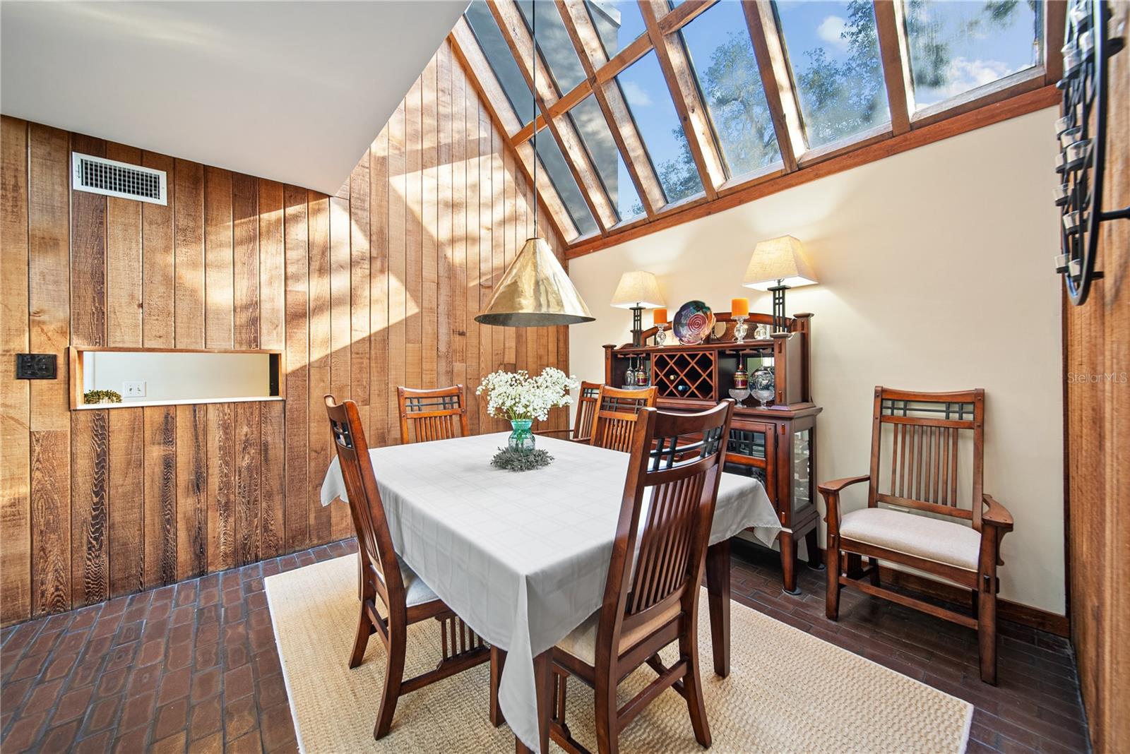 Light & Airy Dining Room with beautiful vaulted windows.