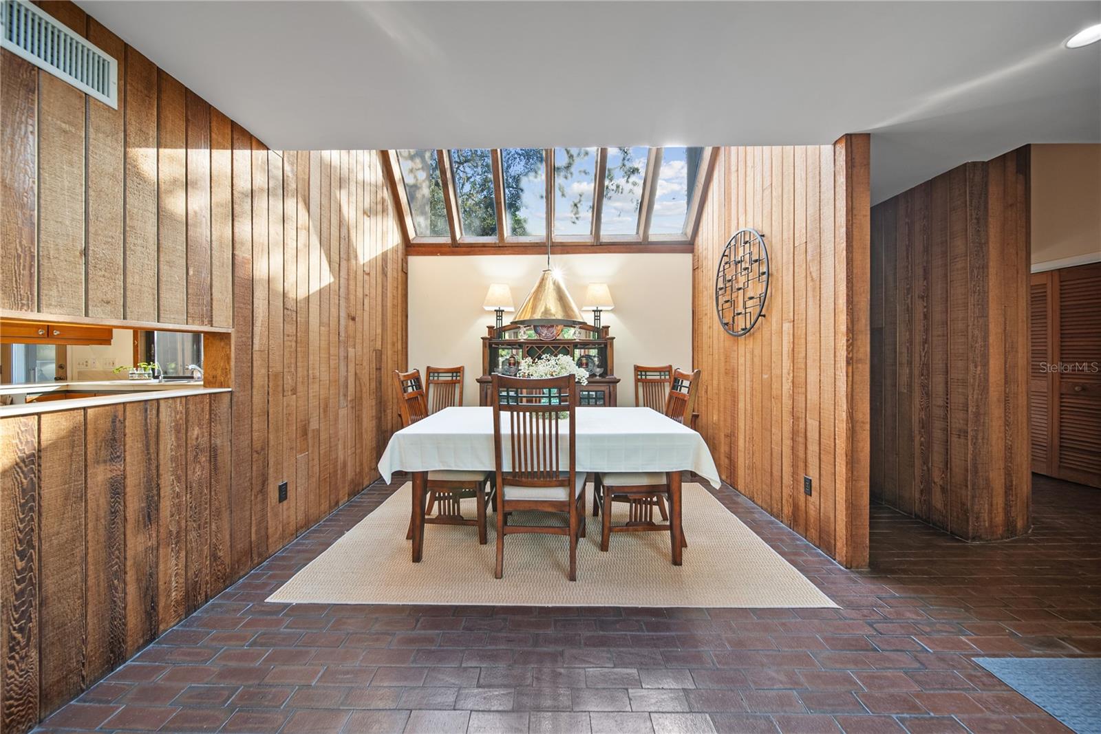 Cedar lined walls & Vaulted Windows give this space so much character