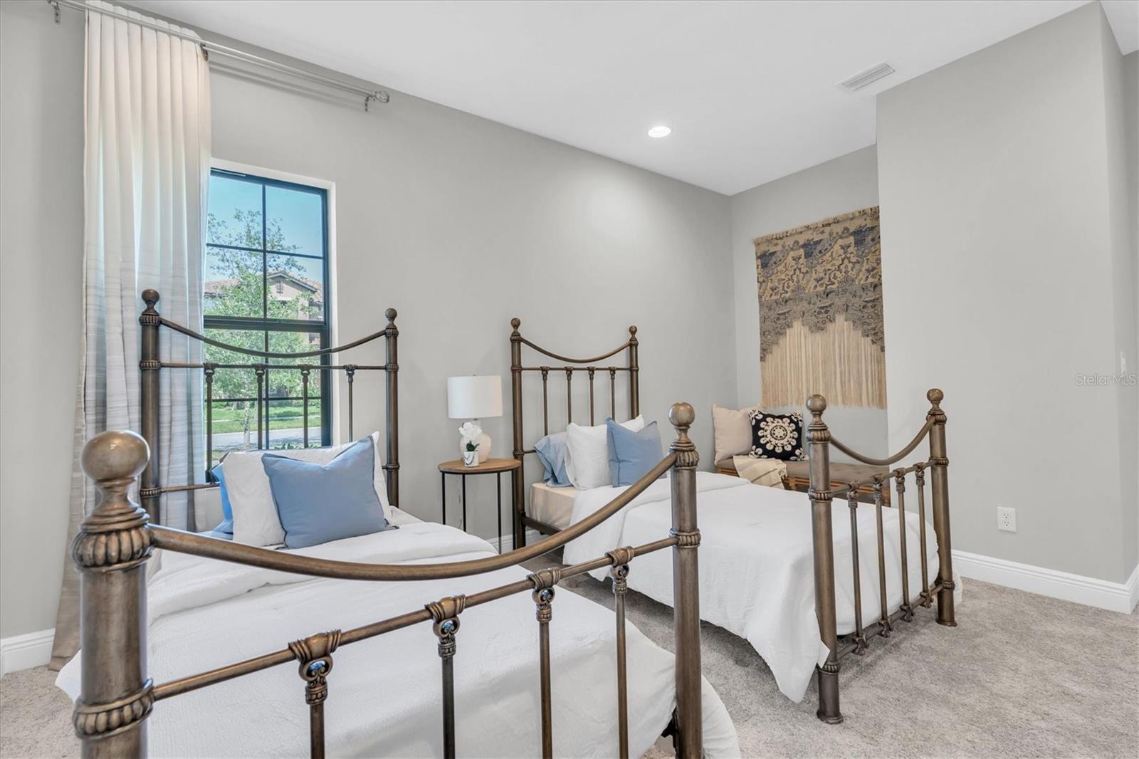 Bedroom 2, 1st floor with walk in closet.