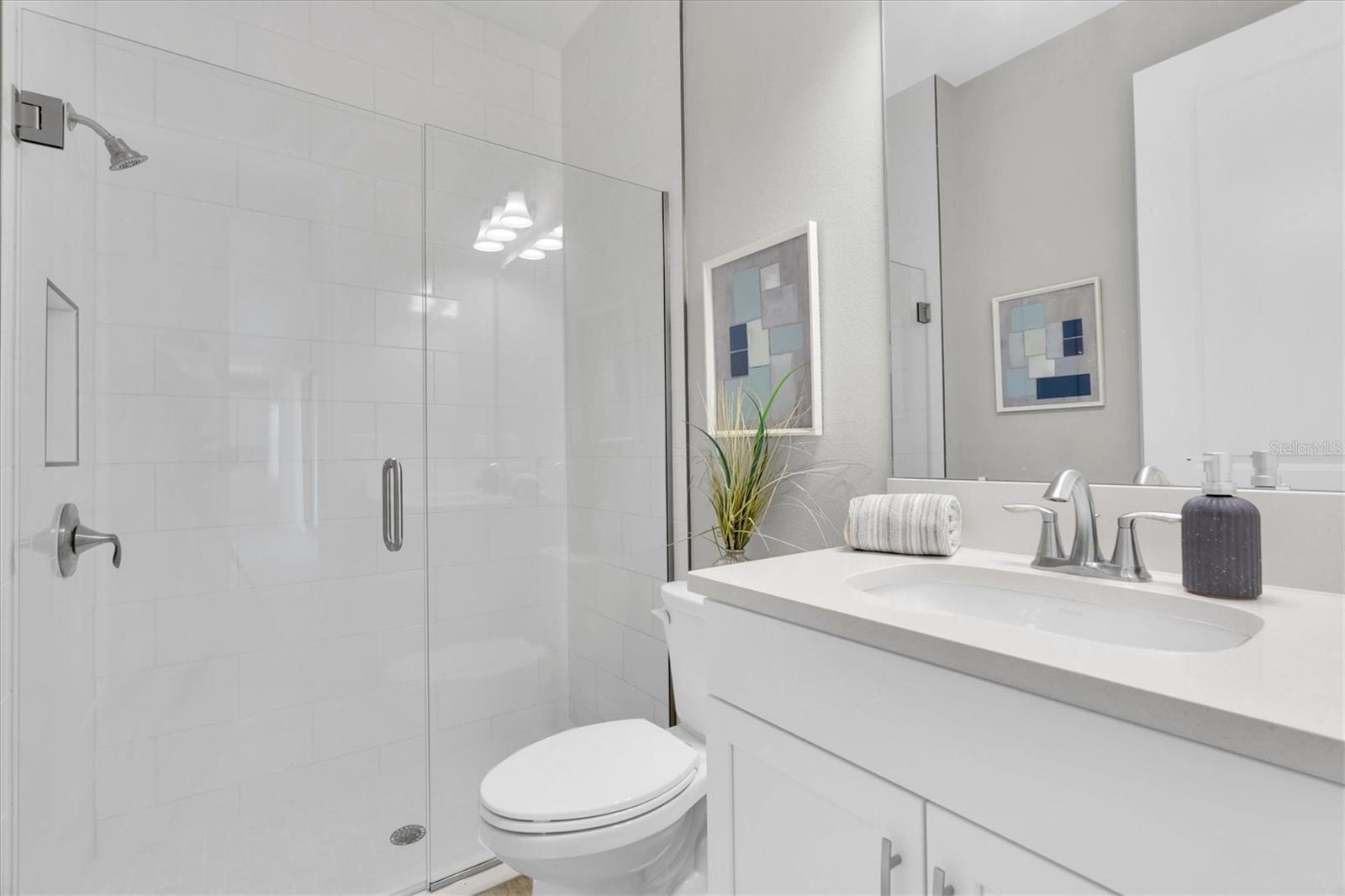1st floor bathroom with walk in shower.