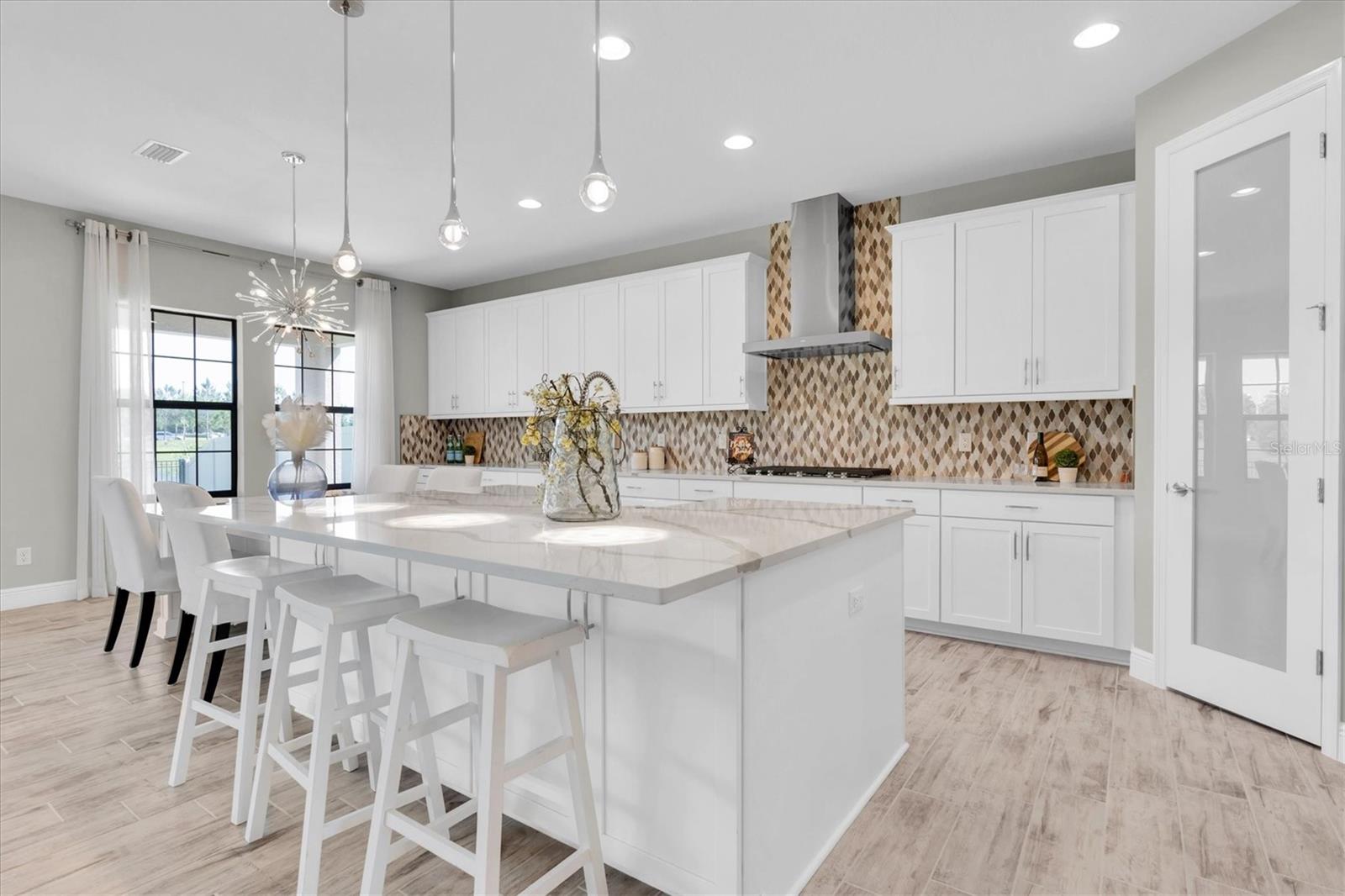 Breakfast bar in gourmet kitchen