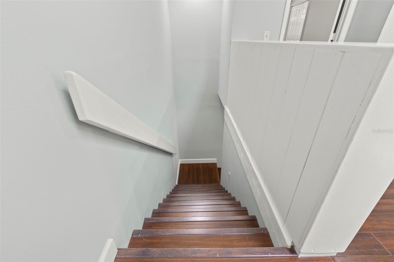 Wood steps to upstairs