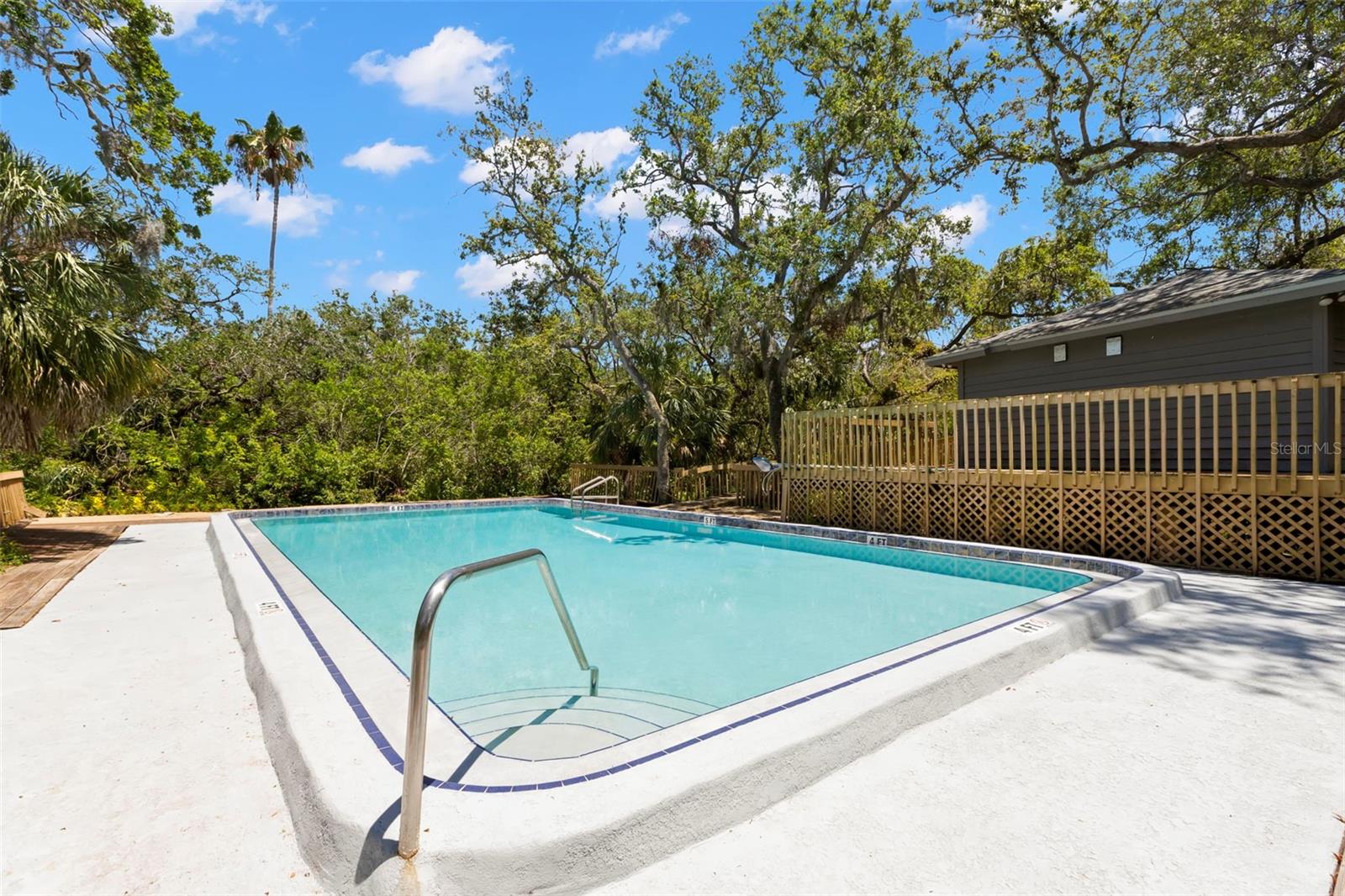 Community pool and spa steps from your back door