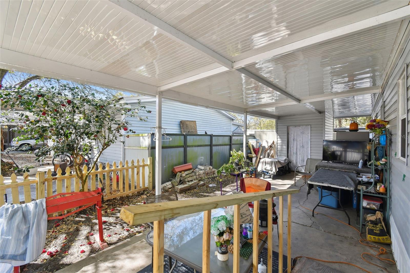 Fenced Carport