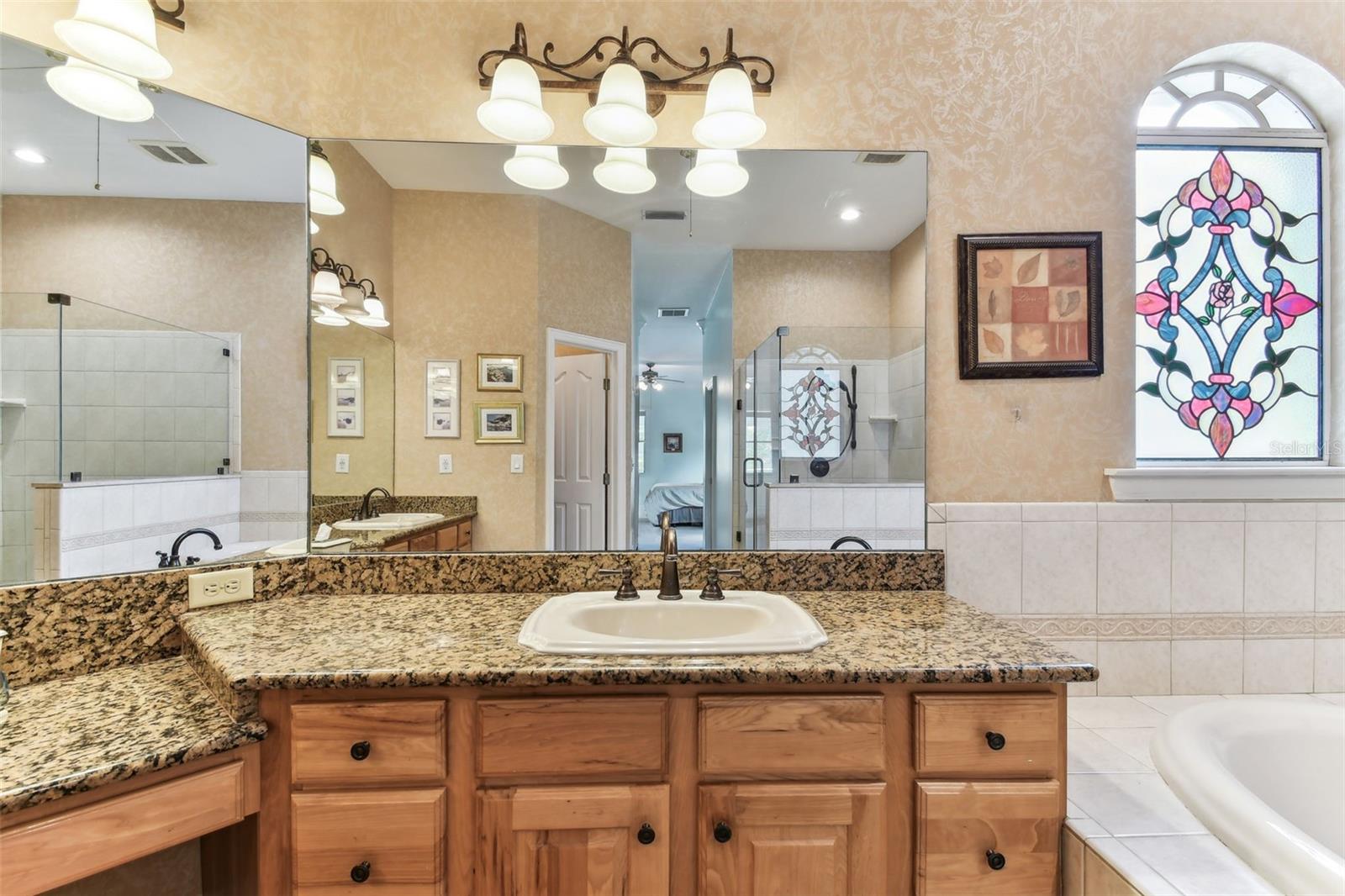 Large ensuite bathroom at 2202 Colewood Ln in Dover, FL.