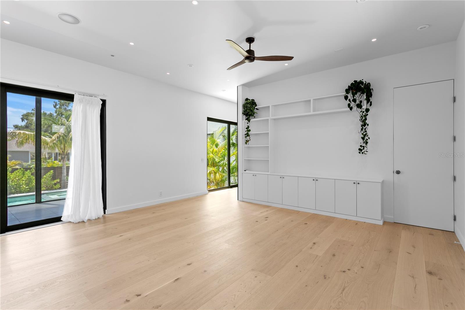 Living/dining room with built-in media center