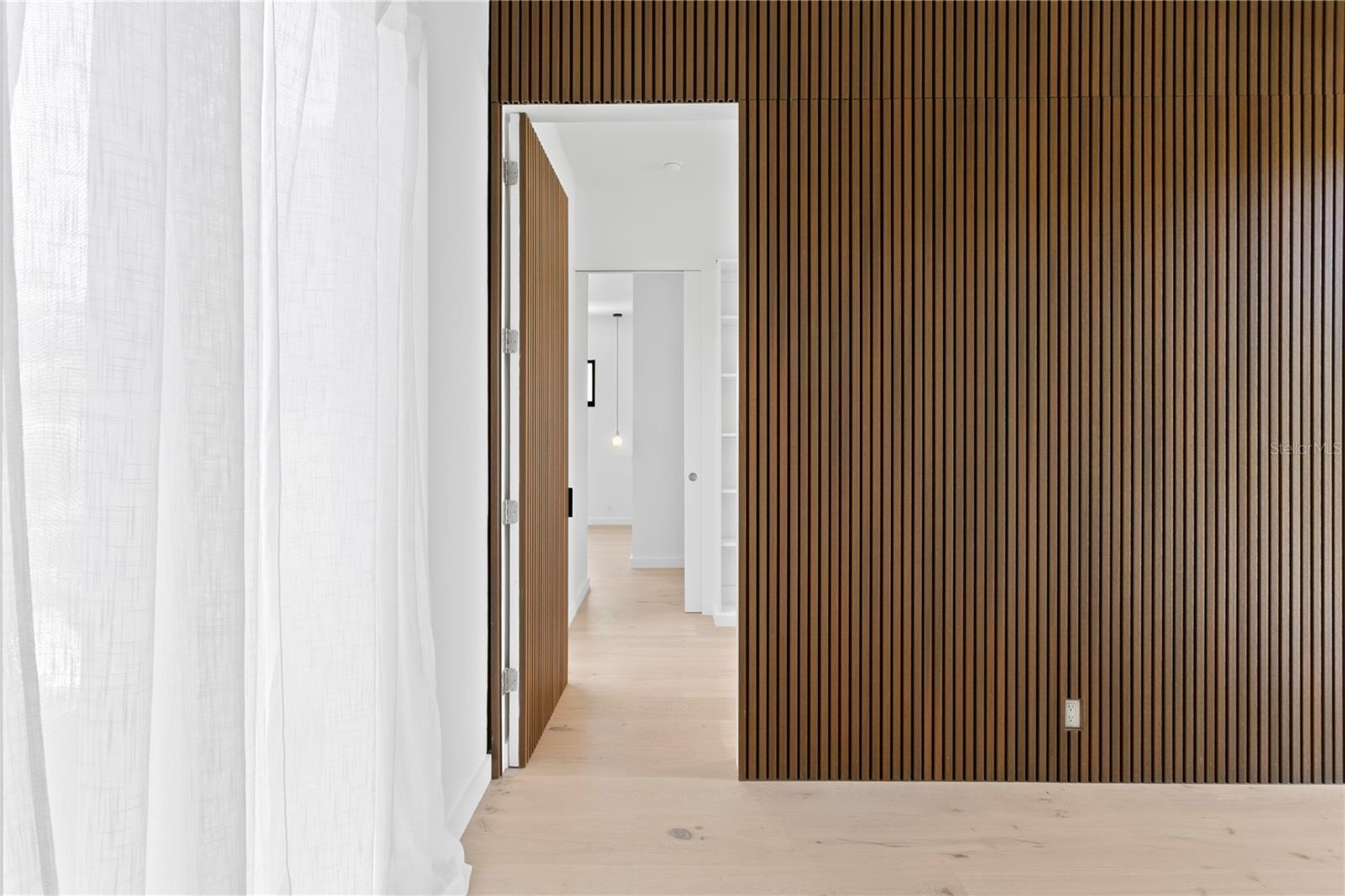 Hidden enclave for primary suite