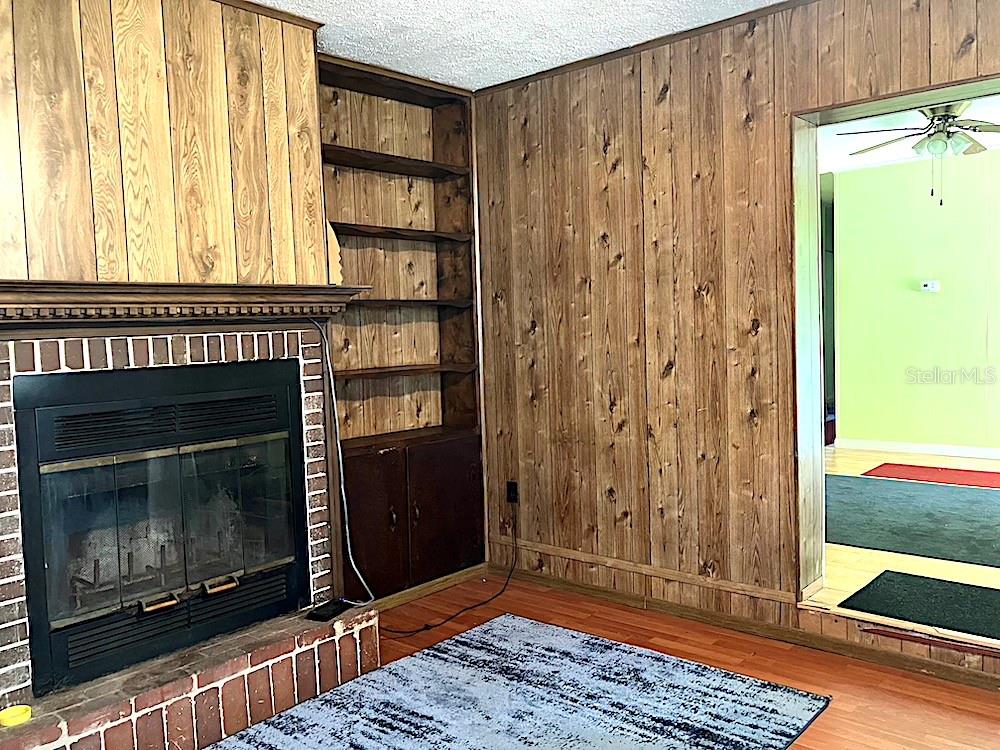 FAMILY ROOM; ENTRY AT TEH RIGHT LEADS TO LIVING ROOM