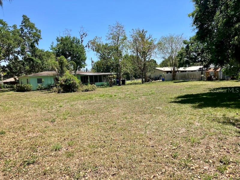 VIEW FROM BACK OF LOT LOOKING TOWARDS HOUSE