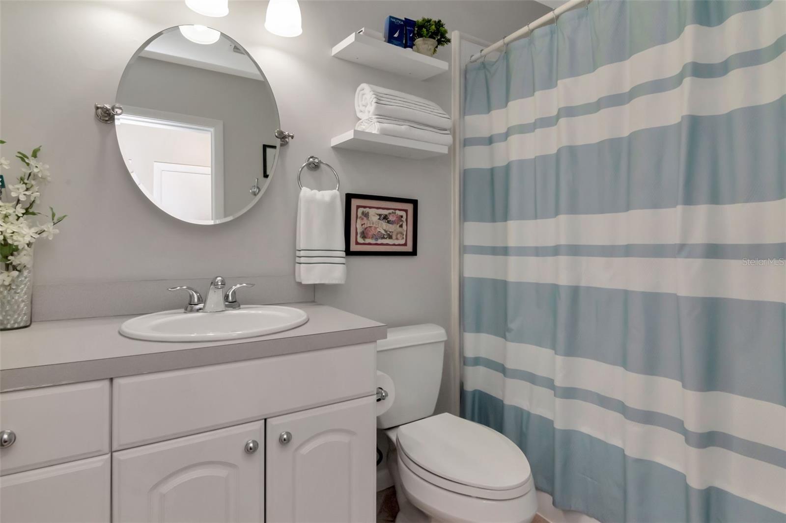 2nd bath is conveniently located in hall by bedrooms 2 & 3