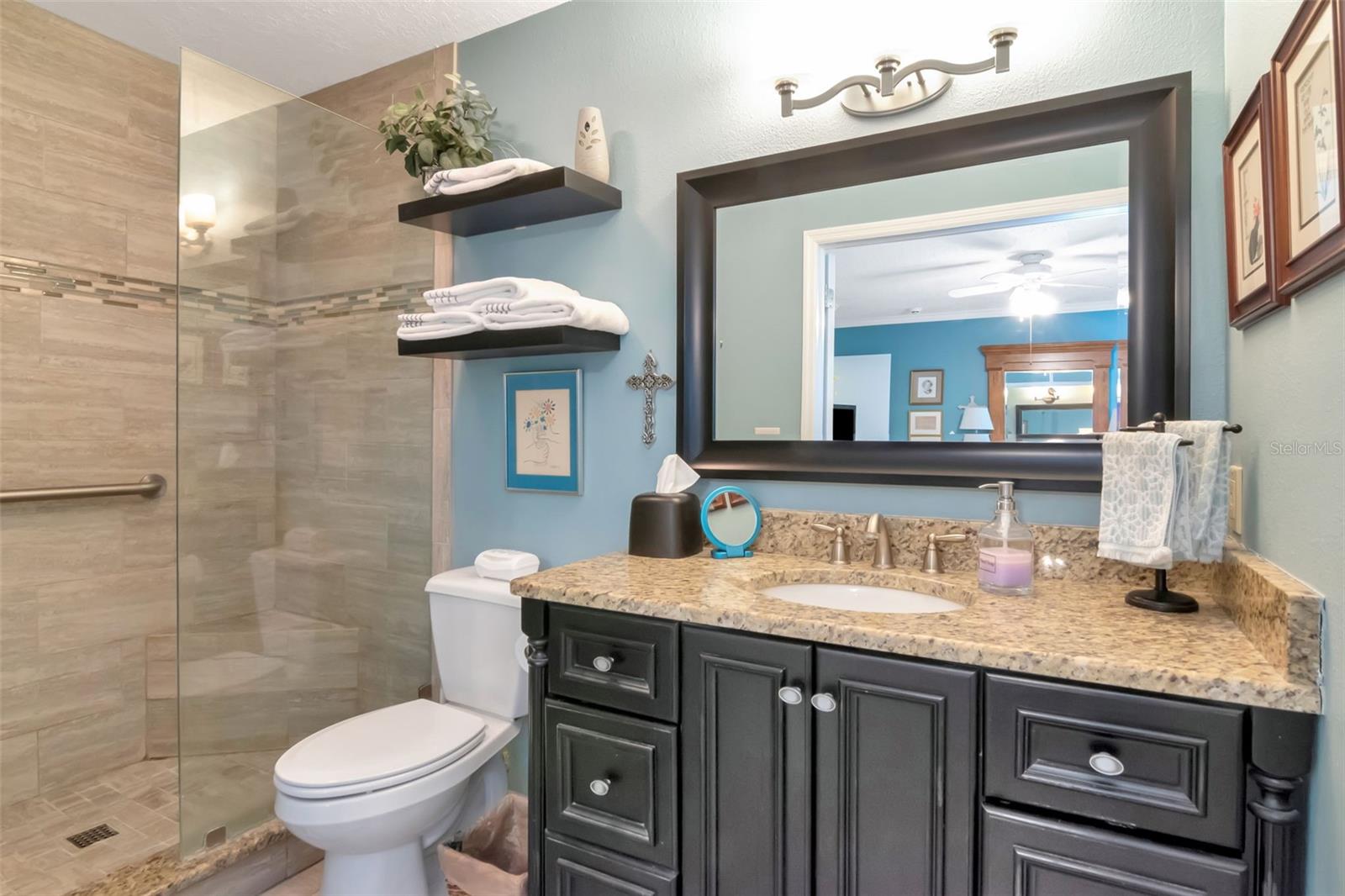 Primary bath is updated with large shower.