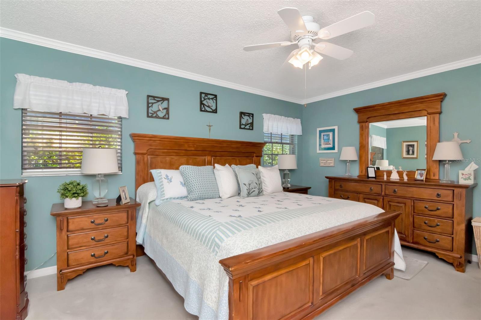 Ground floor primary bedroom offers plenty of space for king size bed plus dressers - and has two closets: one walk in and a double wall closet.