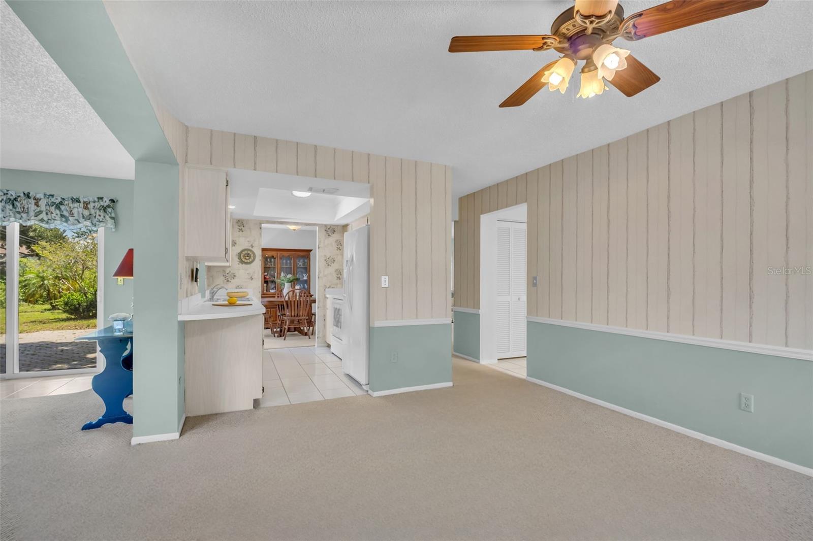 Family room open to kitchen & Florida room~