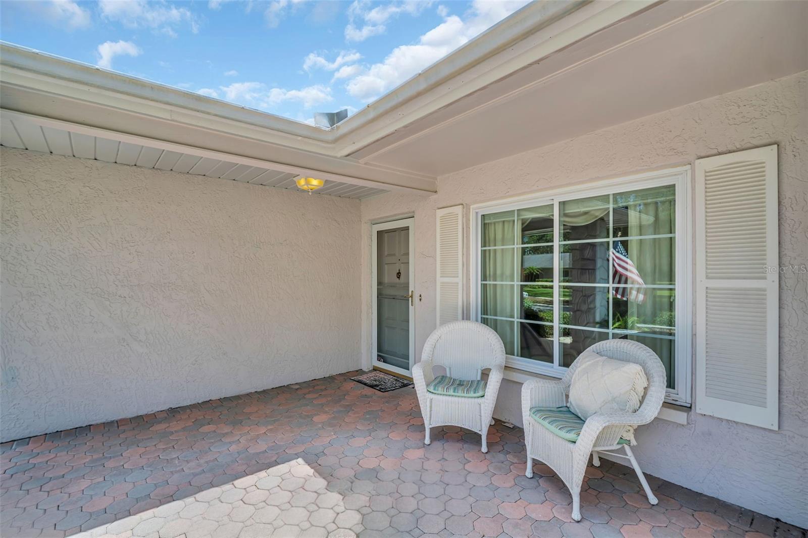 Inviting front patio to enjoy your morning coffee~