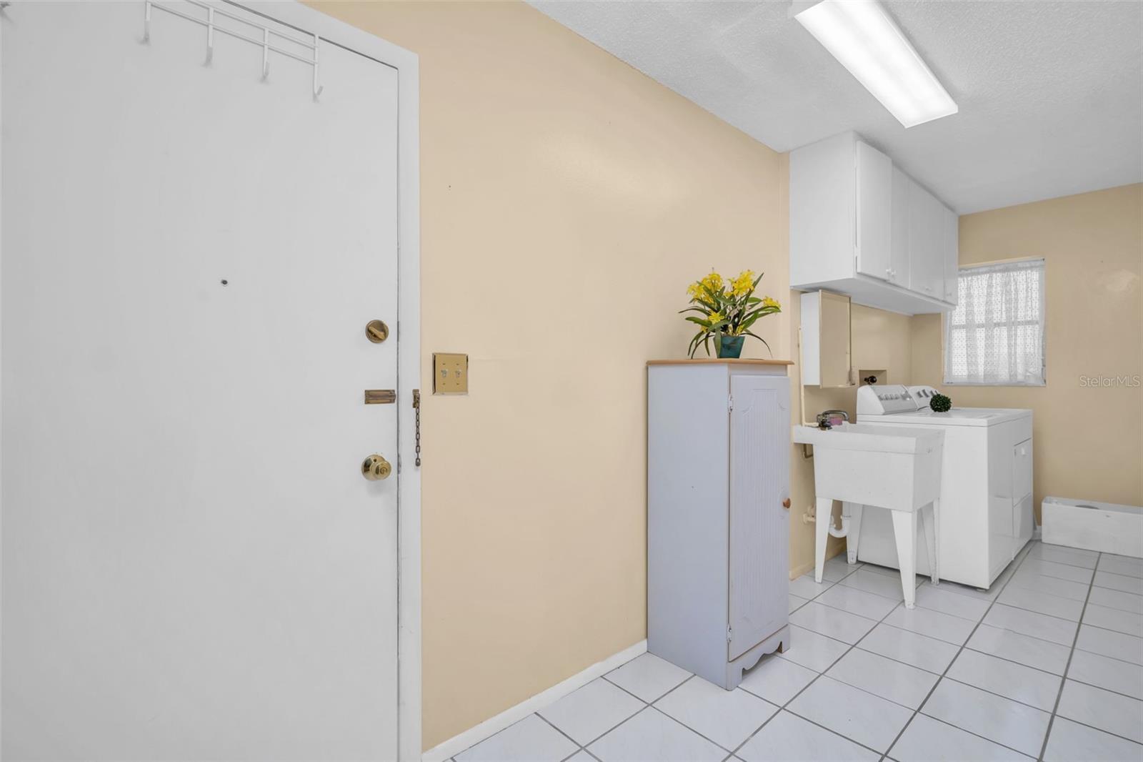 Spacious indoor laundry with garage access~
