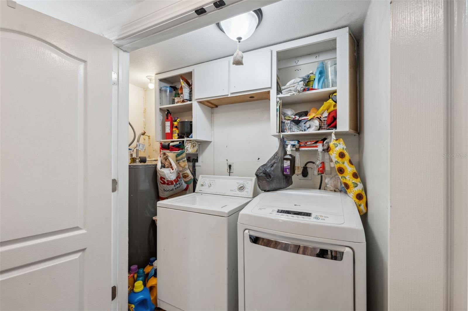 Laundry room with double doors