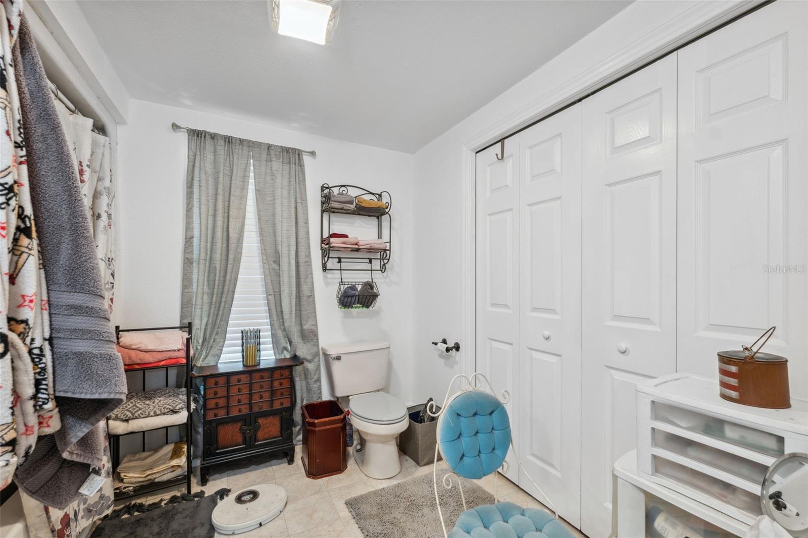 full closet in bathroom
