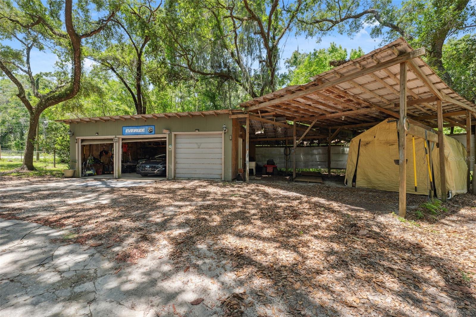 2 & 1/2 car garage with carport