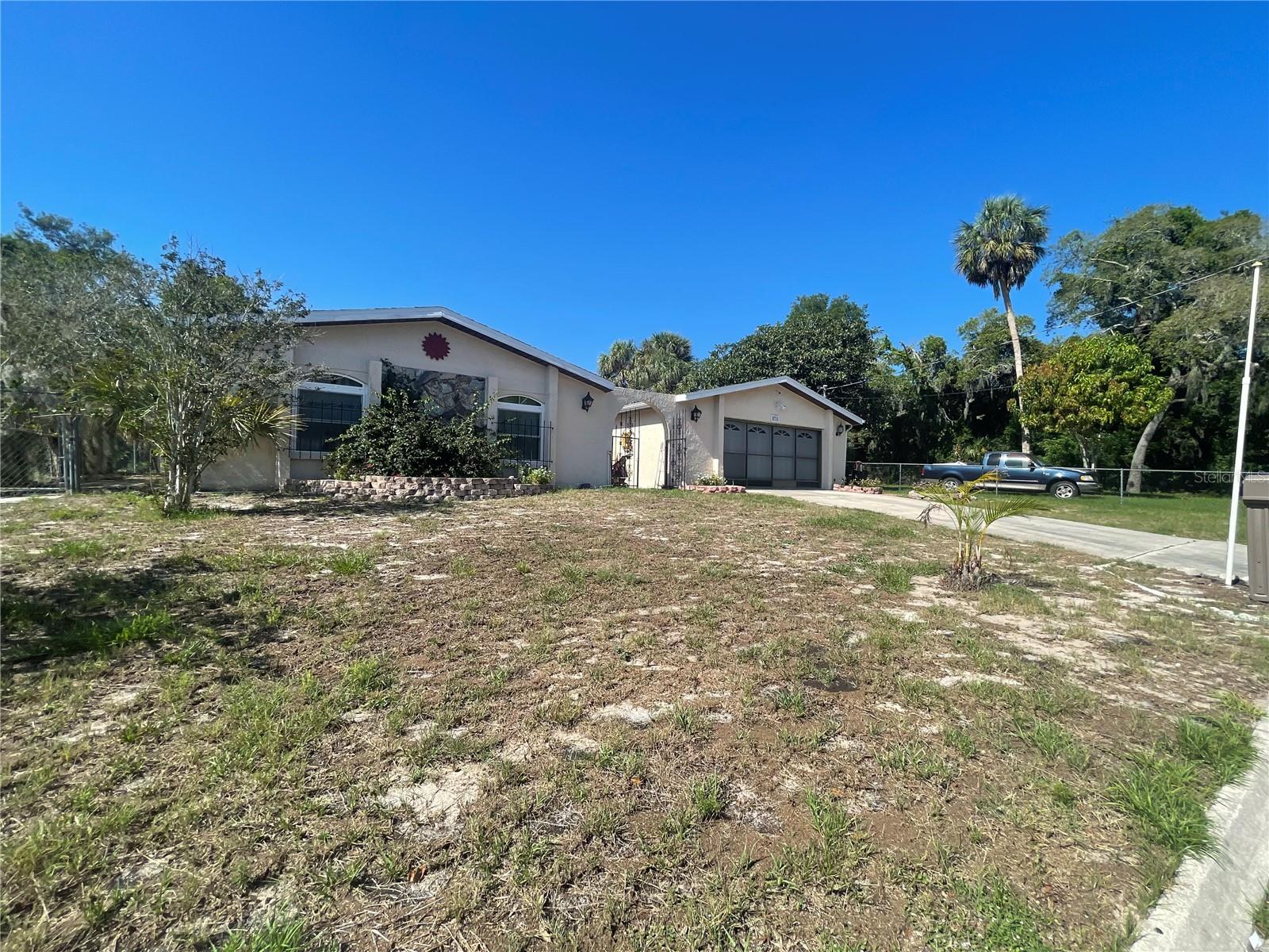 3 bedroom, 2 bath, 2 car garage with extra lot next door totally fenced.