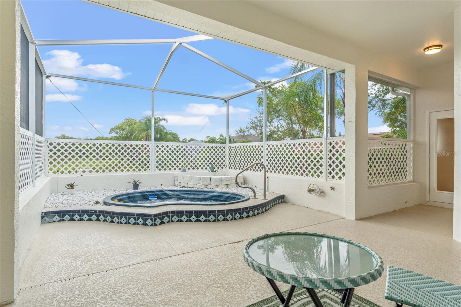 Enclosed Rear Patio w/ Spa