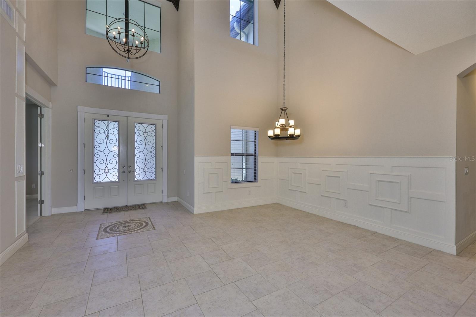 Foyer with inlaid tile