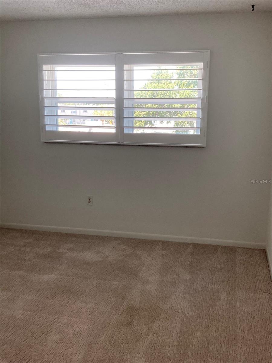 Bedroom with carpet
