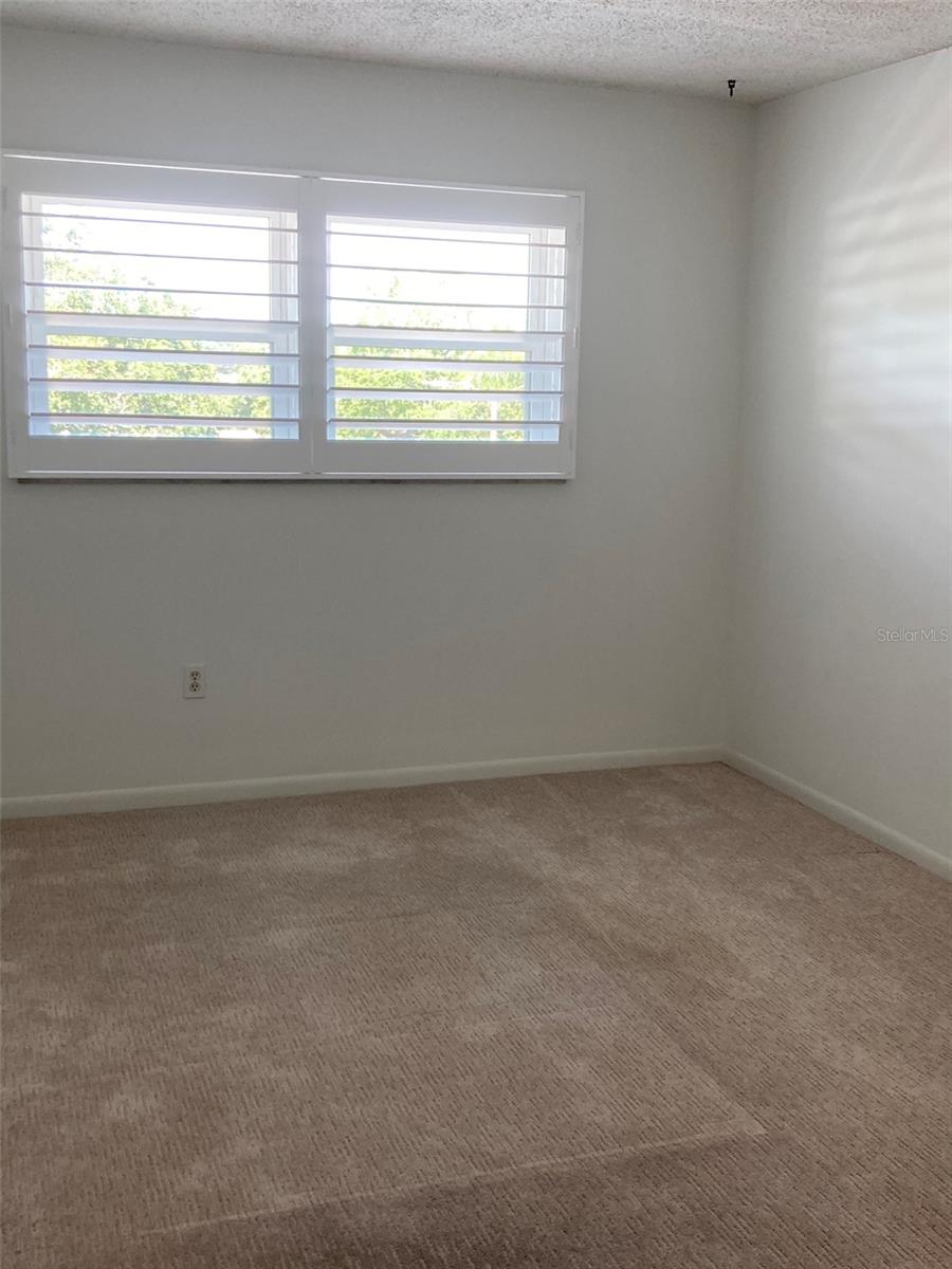 Bedroom with plantation shutters