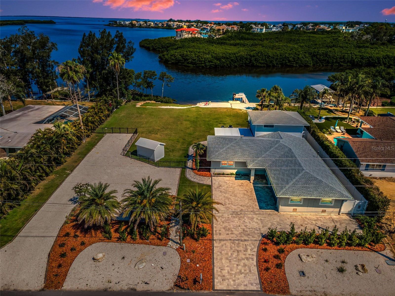 Just Look At This!! Over a 1/2 acre of Flat Level Land on 140' of Water Frontage wide Open Gulf Access